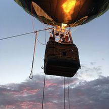 fire in flying hot air balloon